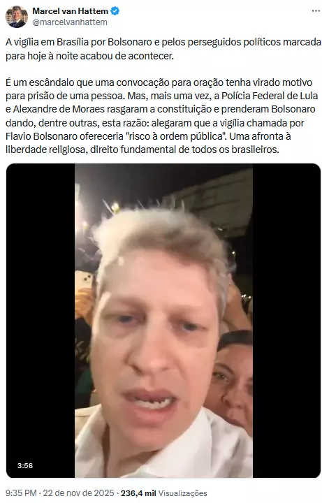 A imagem mostra uma captura de tela de uma postagem do perfil ‘Marcel van Hattem’, que inclui um vídeo em formato vertical no qual aparece, em primeiro plano, um homem de pele clara, cabelos curtos e claros, usando camisa de tom claro, filmado de muito perto em um ambiente noturno com luzes fortes ao fundo; atrás dele é possível ver outras pessoas parcialmente enquadradas, algumas segurando celulares, enquanto a área superior da postagem exibe o texto escrito pelo perfil.