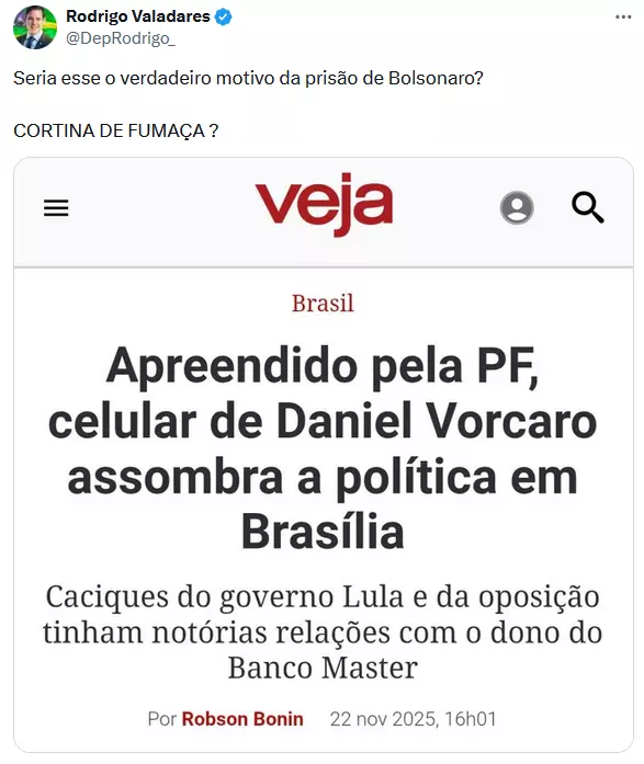 A imagem mostra uma captura de tela de uma postagem no X em que o perfil exibido questiona o motivo da prisão de Bolsonaro e menciona a expressão ‘CORTINA DE FUMAÇA?’, seguida de uma imagem incorporada que reproduz a capa de uma matéria do site da revista ‘veja’, com o título ‘Apreendido pela PF, celular de Daniel Vorcaro assombra a política em Brasília’ e subtítulo sobre relações de figuras políticas com o dono do Banco Master, além da identificação do autor e da data da publicação.