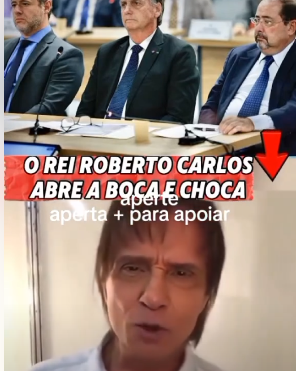 Montagem reúne duas cenas. Na parte superior, há uma foto de uma reunião com três homens de pele clara sentados à mesa: ao centro, Jair Bolsonaro, com cabelo curto castanho escuro, vestindo terno escuro, camisa branca e gravata azul; à esquerda, um homem com cabelo curto grisalho e barba curta, de terno escuro e gravata; à direita, um homem com cabelo curto escuro, barba e óculos, usando terno escuro, camisa clara e gravata azul. Na parte inferior, aparece um frame de vídeo com Roberto Carlos, homem idoso de pele clara, cabelo liso castanho de comprimento médio, vestindo camisa clara, olhando para a câmera. Sobre a montagem, há uma faixa vermelha com texto que diz: ‘O REI ROBERTO CARLOS ABRE A BOCA E CHOCA’.