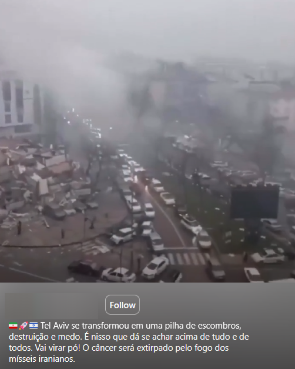 Área urbana vista de ponto elevado sob céu cinzento e com grande quantidade de poeira ou fumaça no ar. À esquerda, há destroços espalhados pelo chão e estruturas danificadas próximas a prédios. Na parte inferior da publicação, aparece um texto que afirma: ‘Tel Aviv se transformou em uma pilha de escombros, destruição e medo. É nisso que dá se achar acima de tudo e de todos. Vai virar pó! O câncer será extirpado pelo fogo dos mísseis iranianos.’
