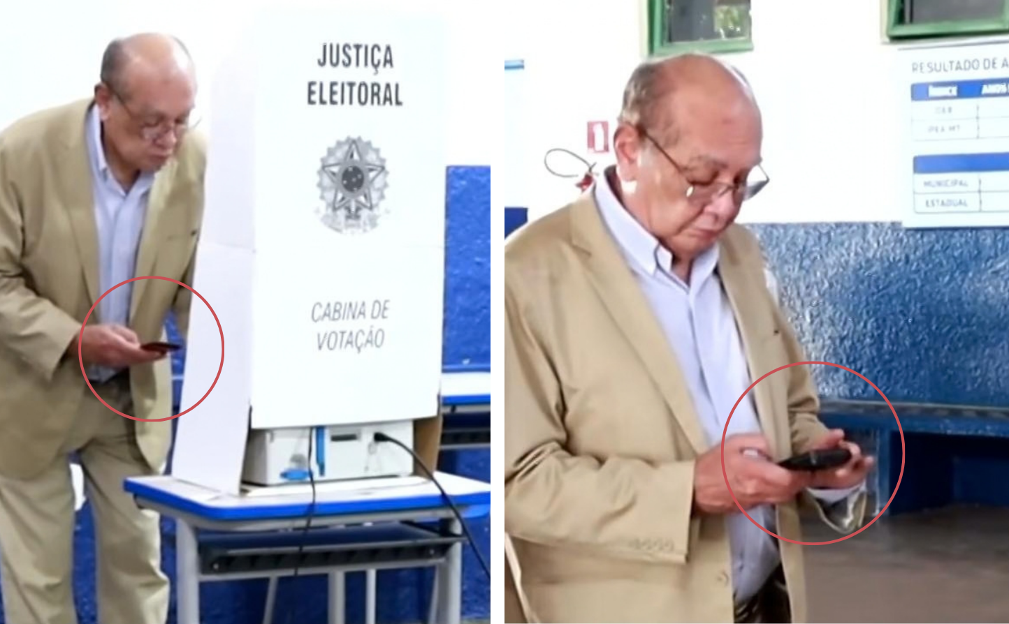 Montagem de duas fotos do ministro Gilmar Mendes — homem de pele clara, calvo no topo da cabeça, com cabelos grisalhos nas laterais e óculos de grau —, vestindo paletó bege e camisa azul-clara. Na imagem da esquerda, ele aparece em pé, inclinado sobre uma cabina de votação de papelão com o brasão da República e os dizeres 'JUSTIÇA ELEITORAL' e 'CABINA DE VOTAÇÃO', posicionada sobre uma mesa escolar de tampo azul e estrutura metálica. Na imagem da direita, ele é exibido em plano aproximado do mesmo ambiente. Em ambas as fotos, círculos brancos destacam suas mãos segurando um celular na cor escura. Ao fundo, há paredes azuis e brancas com cartazes informativos.