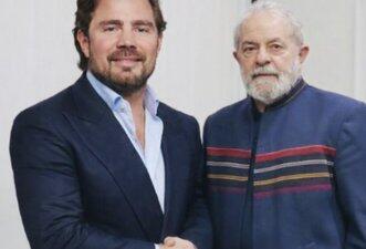 Foto que mostra aperto de mãos de Lula e Vorcaro é montagem