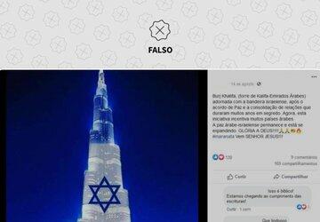 É montagem foto que mostra torre em Dubai projetando a bandeira de Israel